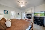 Bedroom with TV & Fireplace
